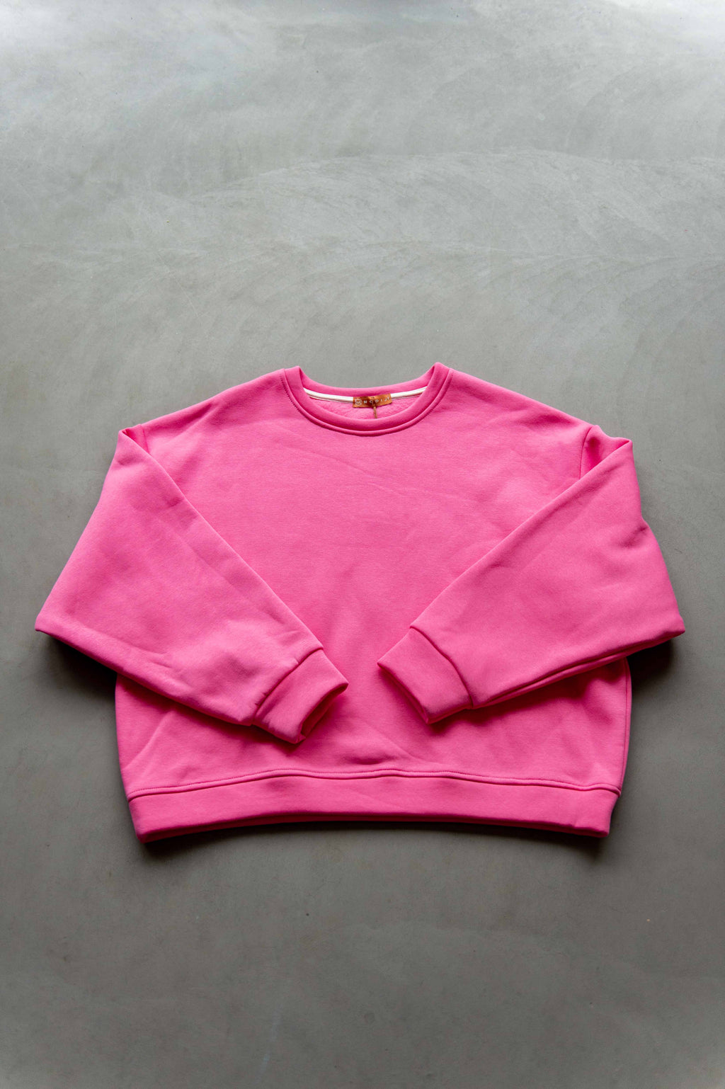 Winter: sweater roze met rode letters